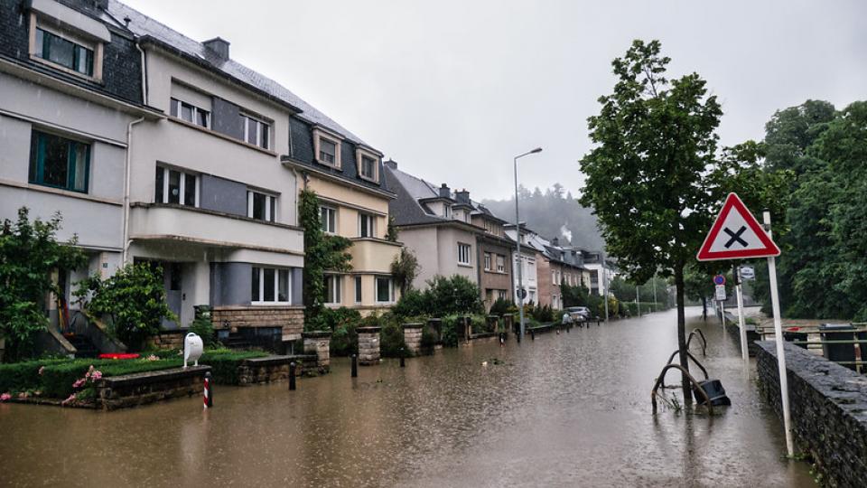 Flooding in a street in Clausen, Luxembourg, July 2021. Photo by Tristan Schmurr via Flickr, CC BY 2.0 DEED.: 