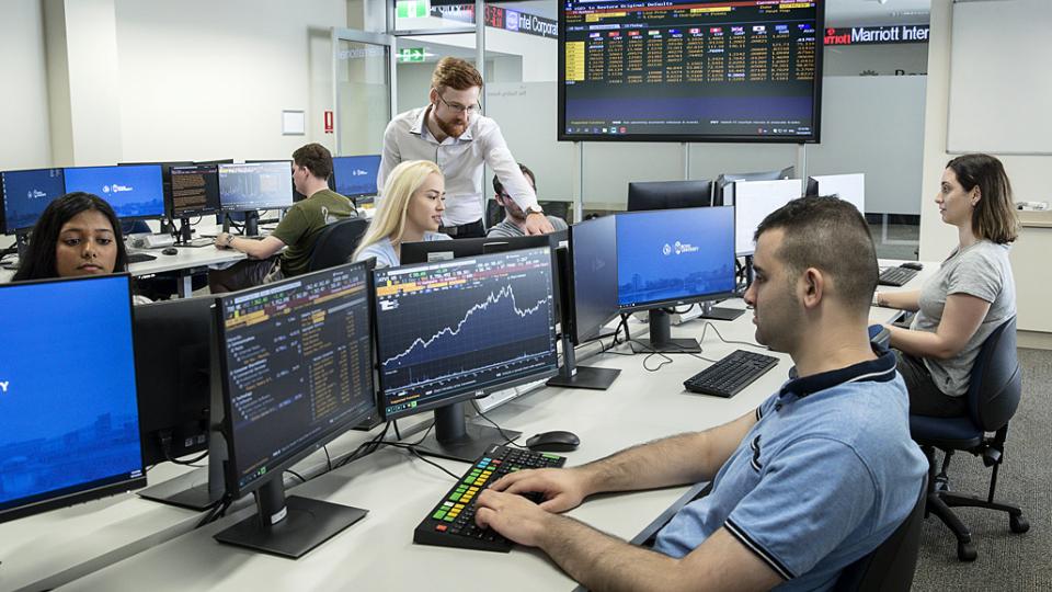 Bloomberg terminals in use. Photo by Lisa Barker via Flickr (CC BY-NC-ND 2.0)