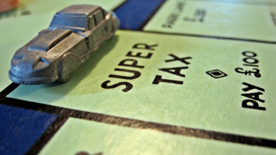Paying taxes. Image via Flickr CC-BY-2.0.