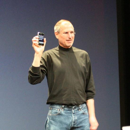 Steve Jobs presenting the original iPhone in 2007. Photo by Nobuyuki Hayashi via Flickr CC-BY-2.0