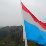 Luxembourg flag at Vianden castle. Photo by Bogdan Tapu via Flickr CC-BY-2.0.
