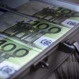 Euro notes in a suitcase. Photo: iStock.
